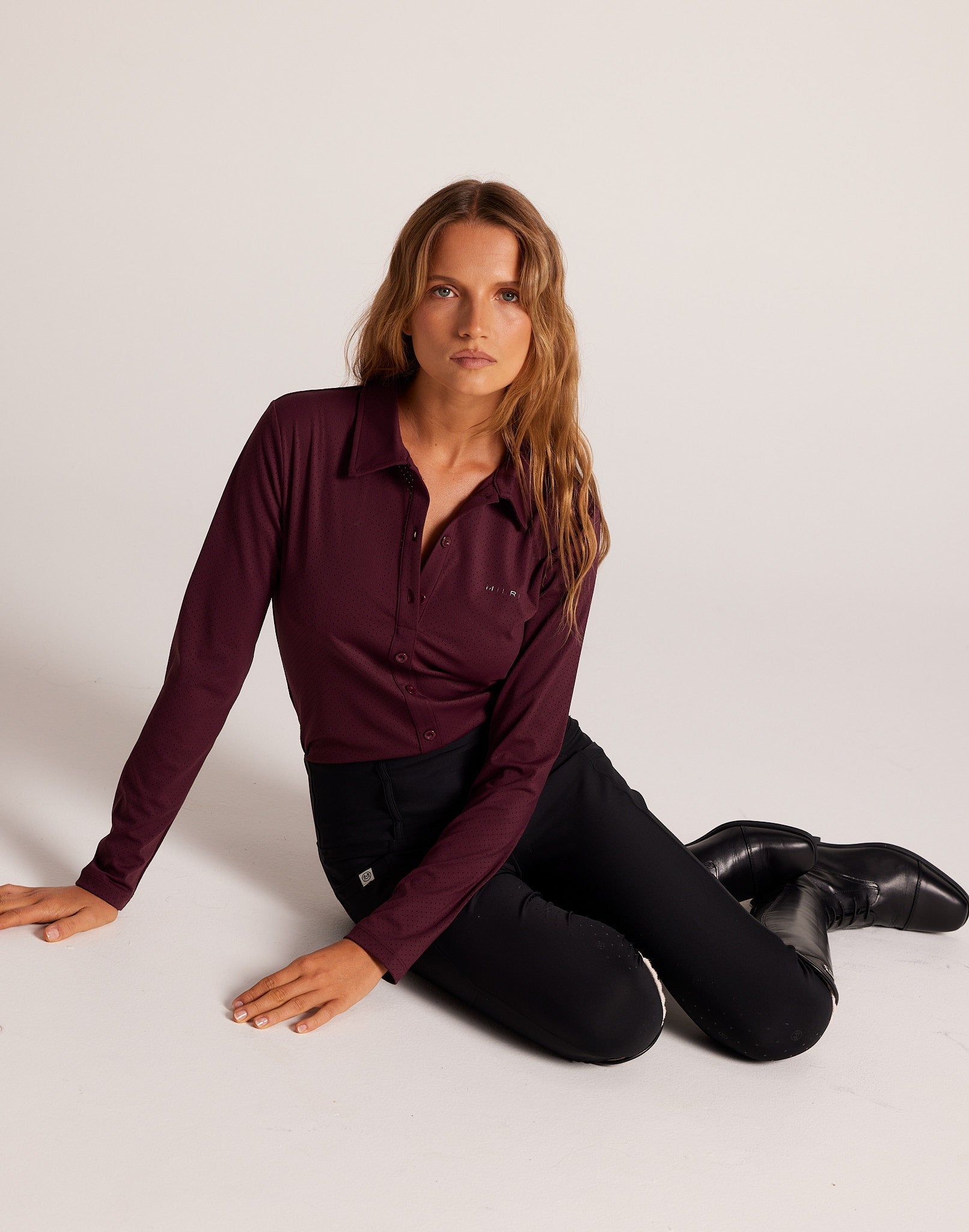 Milrey women's long sleeve riding shirt in sumac burgundy. Casual fit polo blouse for comfortable equestrian wear. Dressage Show Jumping Eventing Competition riding blouse shirt.