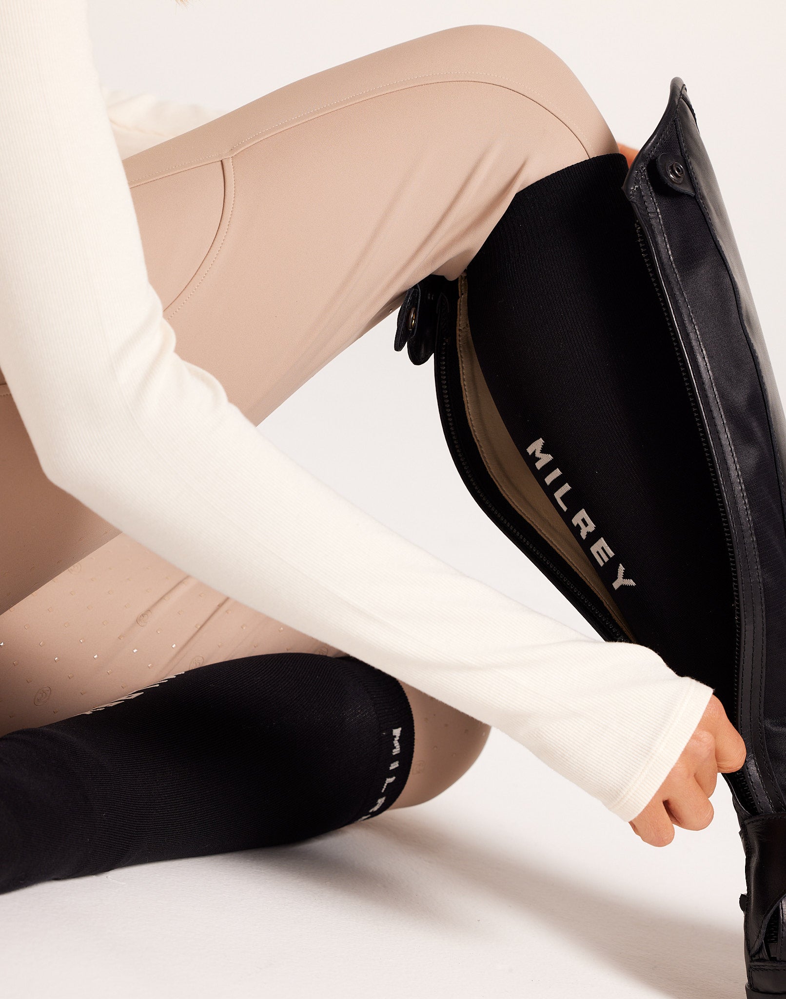 Women's knee-high ribbed slouch socks. Neutral cream socks. 100% soft cotton casual socks ideal for off-duty looks, gumboots, and everyday wear.